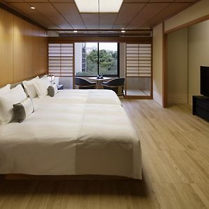 Kamer met Twee Aparte Bedden in Japanse Stijl
