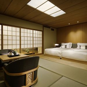 Kamer met Twee Aparte Bedden in Japanse Stijl